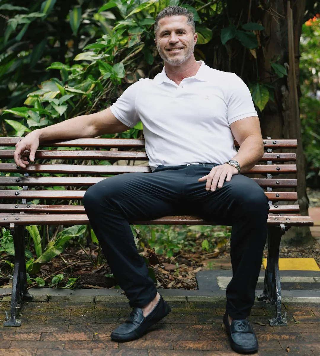 Taylor Wilson - Sober companion sitting on park bench