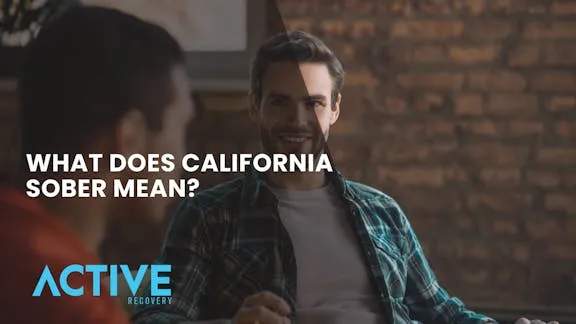 A guy talking to his sober companion in active recovery facility